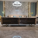 White Marble-Top TV Stand with Woven Leather Sides and Dark Glossy Frame